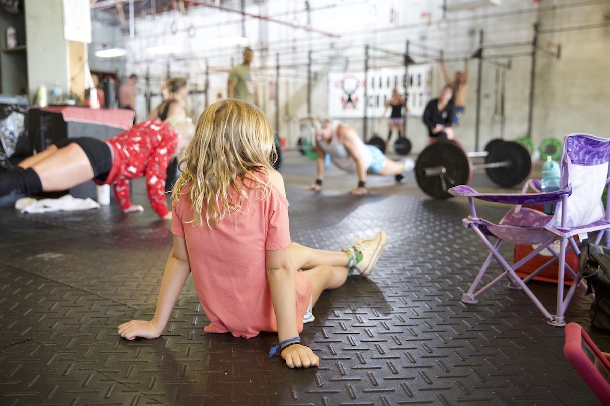 Girl watching women compete