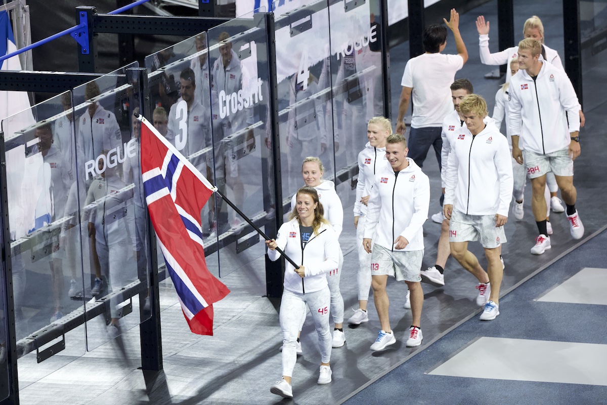 Kristin Holte waves the flag of Norway with her compatriots during the opening ceremony at the 2018 Games. (Photo by Adam Bow) 