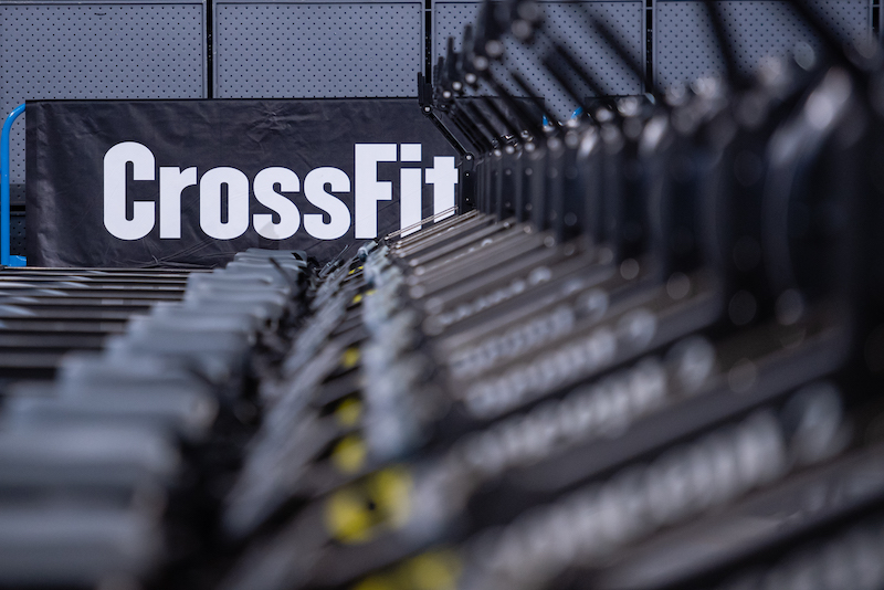 Rowers and the CrossFit logo