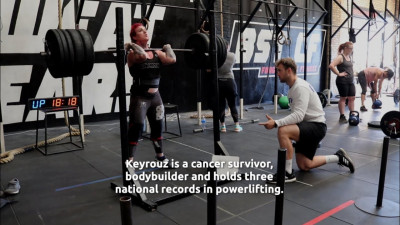 Athlete front squatting